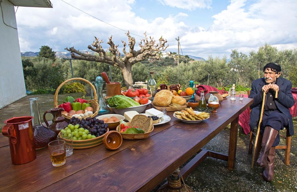 Chania: Authentic Cooking Class in the White Mountains - Inside the Kitchen: Ntakos, Tzatziki, Cretan Cheese, and Wine