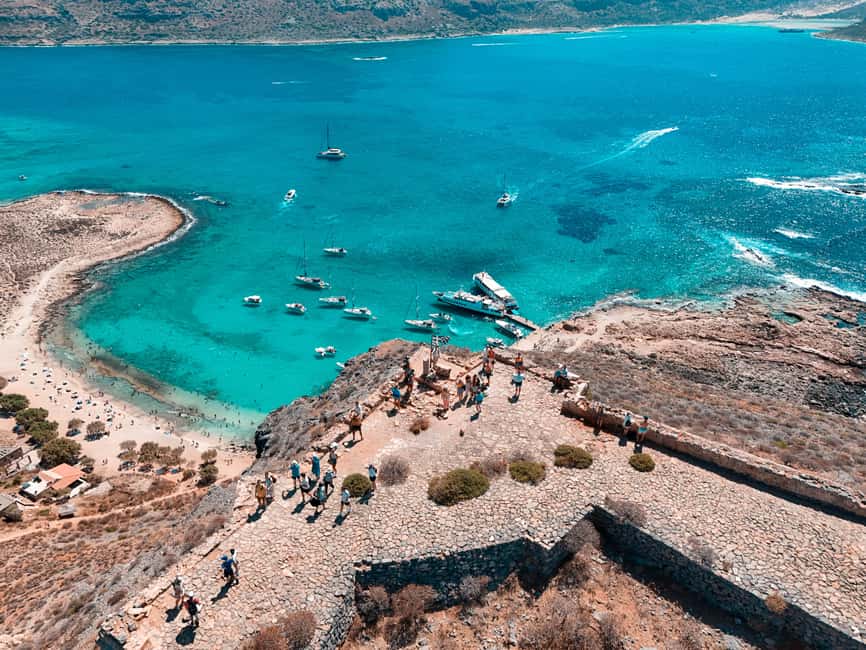 Chania: Balos Gramvousa Cruise with Transfer and Boat Ticket - Balos Lagoon: pink-white sand, turquoise water, and a rocky landing