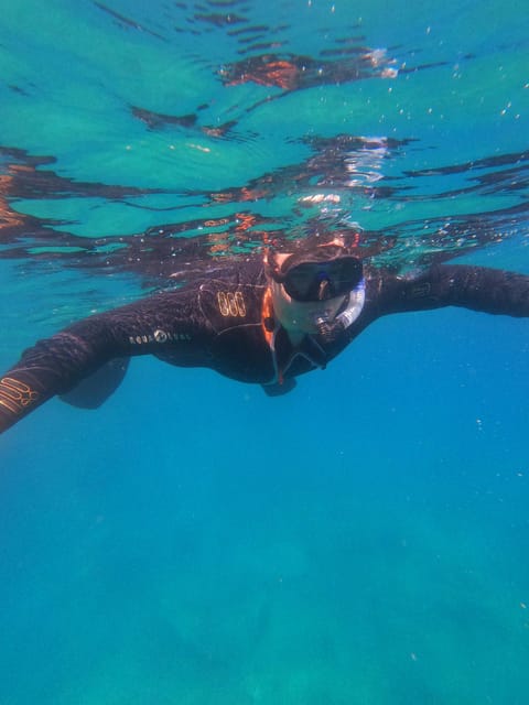 Chania: Boat Trip with Guided Snorkeling Tour - Between the swims: snacks, water, and a chance to reset