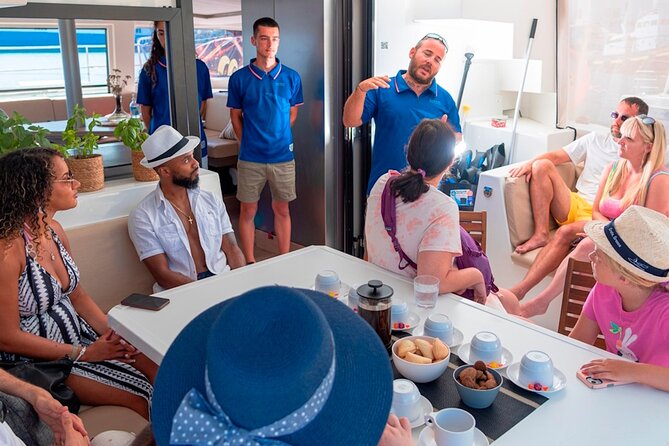 Chania: Morning Catamaran Cruise with Premium Lunch & Drinks - Agioi Theodoroi Stop: Swimming, Snorkeling, SUP, and Even Fishing Gear