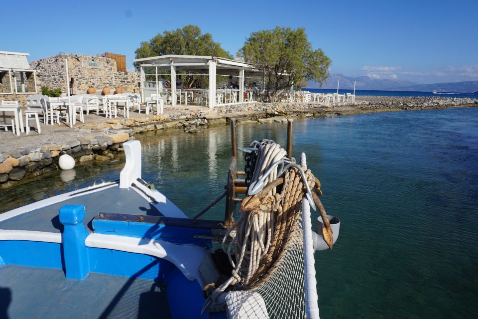 Crete: Fishing & Swimming Boat Cruise with Lunch & Drinks - Sea caves, snorkeling stops, and the calm-water bonus