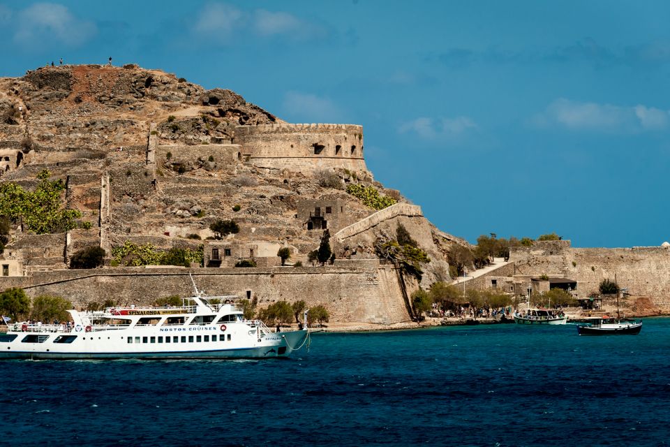 Crete: Spinalonga, Elounda, & Agios Nikolaos Boat Tour & BBQ - Agios Nikolaos and Lake Voulismeni: Shops, Cafés, and That Bottomless-Lake Moment