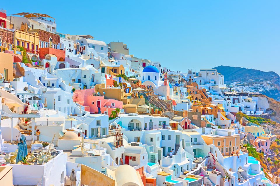 Heraklion: Santorini Day Trip with Boat Transfer & Oia Visit - The Guided Bus Tour: How the Day Makes Sense