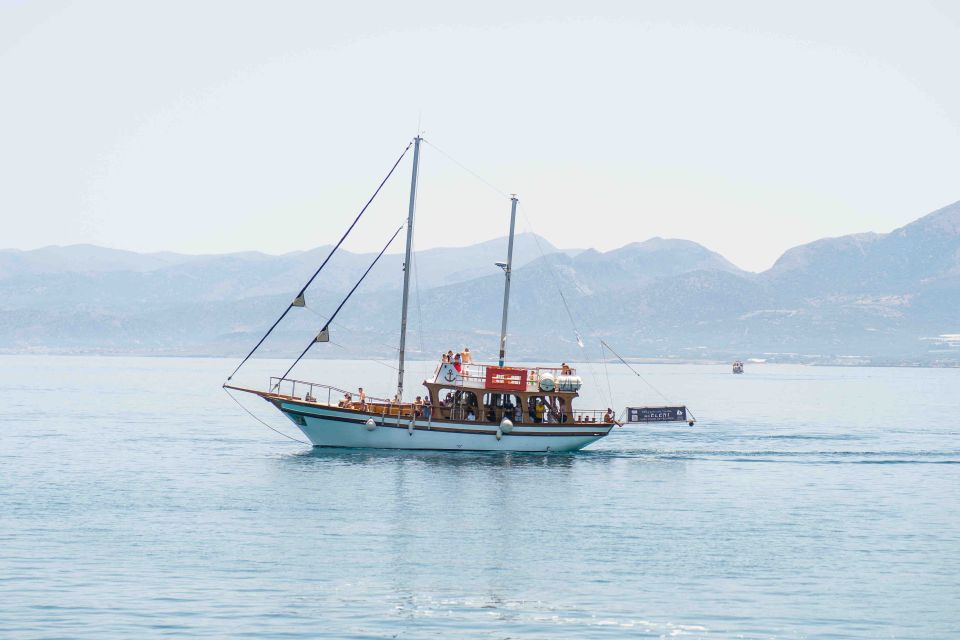 Hersonisos: Boat Cruise with Swim Stops and Lunch - Meeting at the Eleni Traditional Wooden Boat in Hersonissos Port