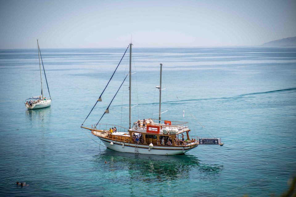 Hersonisos: Boat Cruise with Swim Stops and Lunch - Onboard Comfort: Sunbathing, Music, and How the Crew Runs the Day