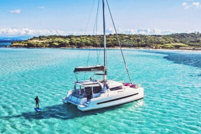Panormo: Luxury Catamaran Cruise with Lunch & Open Bar - The Bay Stop: SUP, Snorkeling, and a Very Pink Float