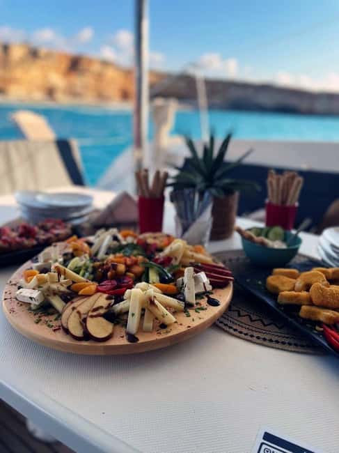 Rethymno: Sailing Catamaran Cruise with Meal & Drinks - Stop pattern and photo moments around Georgioupoli